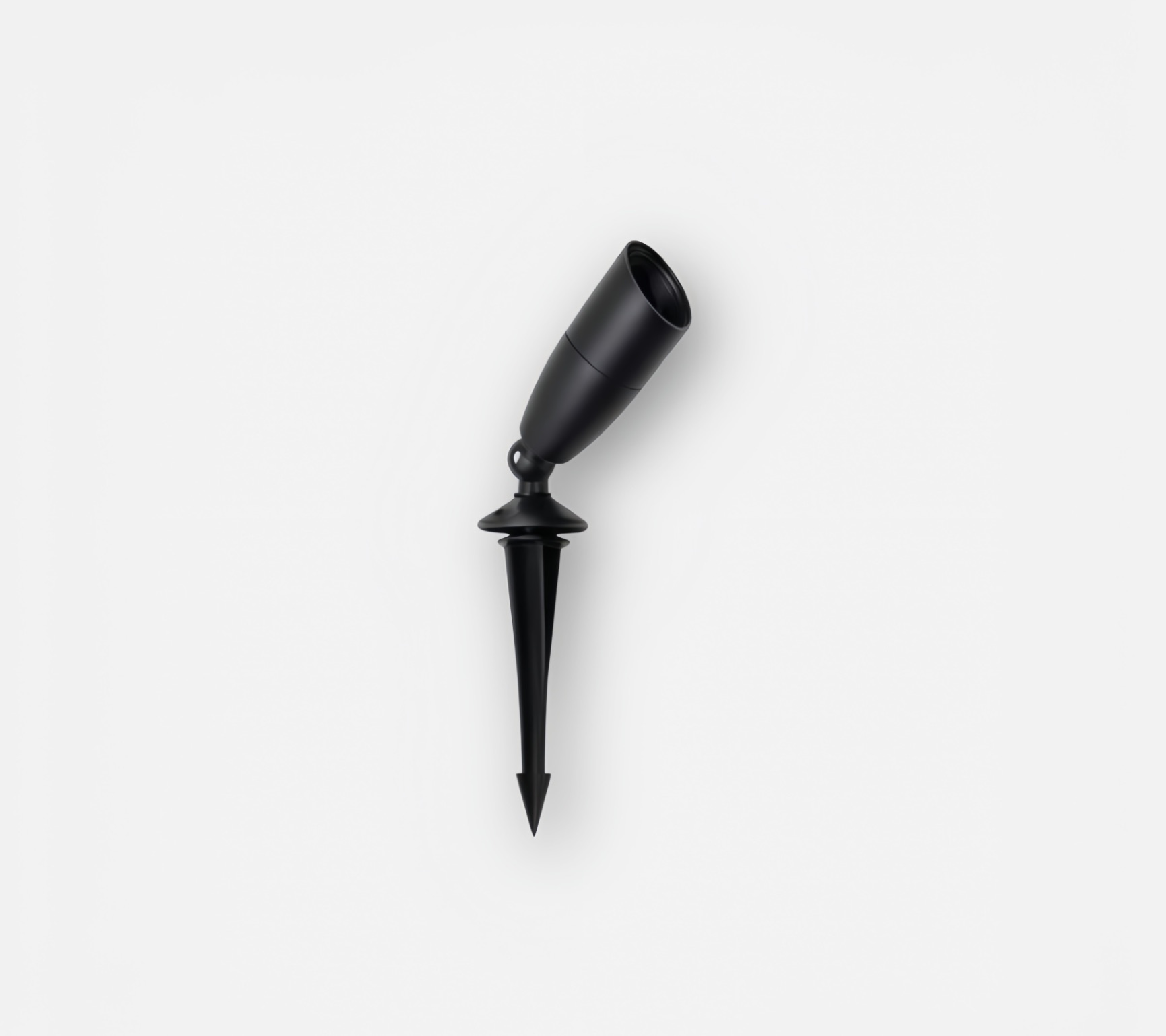 Black outdoor lawn spike light in unlit state - minimalist design with conical stake
